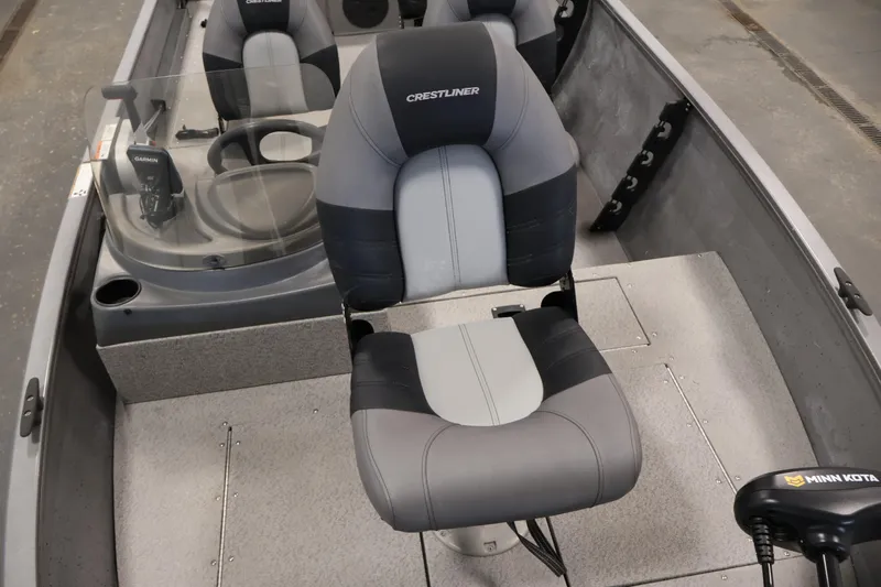 Slide: The Image of 2019 Crestliner 1800 Kodiak SC boat interior with seating and control panel. - 16