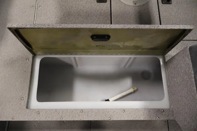 Slide: The Image of Open storage compartment in 2019 Crestliner 1800 Kodiak SC boat. - 22