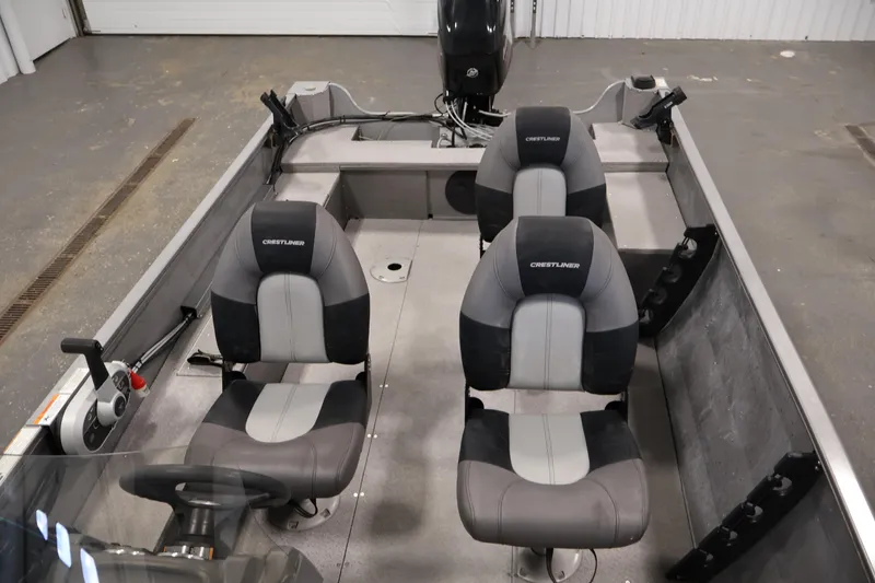Slide: The Image of 2019 Crestliner 1800 Kodiak SC boat interior with four seats and steering console. - 33