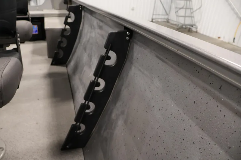 Slide: The Image of 2019 Crestliner 1800 Kodiak SC interior with rod holders and seating. - 34