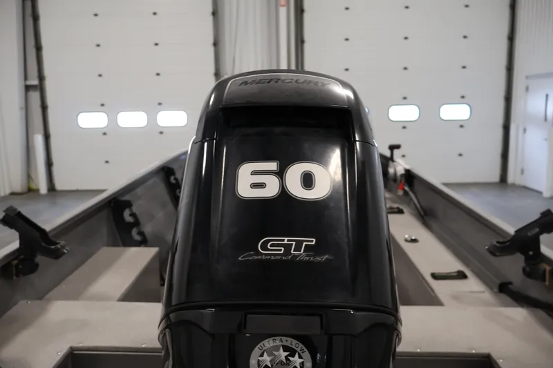 Slide: The Image of 2019 Crestliner 1800 Kodiak SC with Mercury 60 CT outboard motor in garage. - 42