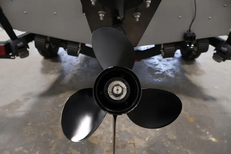 Slide: The Image of Propeller of 2019 Crestliner 1800 Kodiak SC boat in a garage setting. - 44