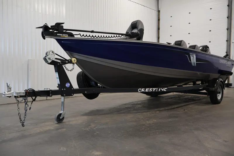 Slide: The Image of 2019 Crestliner 1800 Kodiak SC boat on trailer in indoor setting. - 47