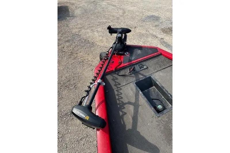 Slide: The Image of 2005 Tracker Pro Team 175 boat with Minn Kota trolling motor on deck. - 11