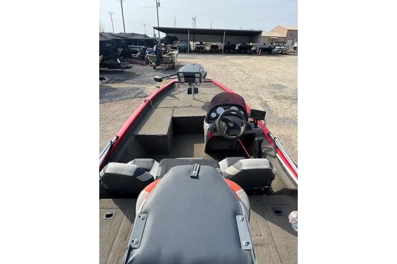 Slide: The Image of 2005 Tracker Pro Team 175 boat interior with steering wheel and seating. - 8