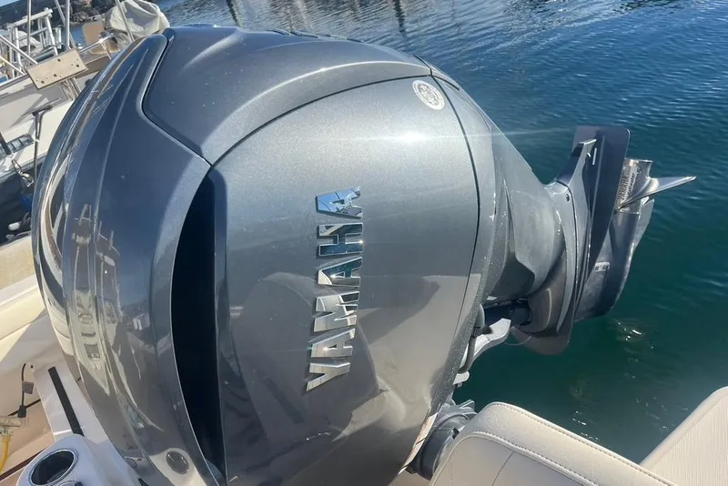 Slide: The Image of Outboard engine of 2023 Grady-White Adventure 218, 250 V6 4.2L, ultra-low emissions. - 12
