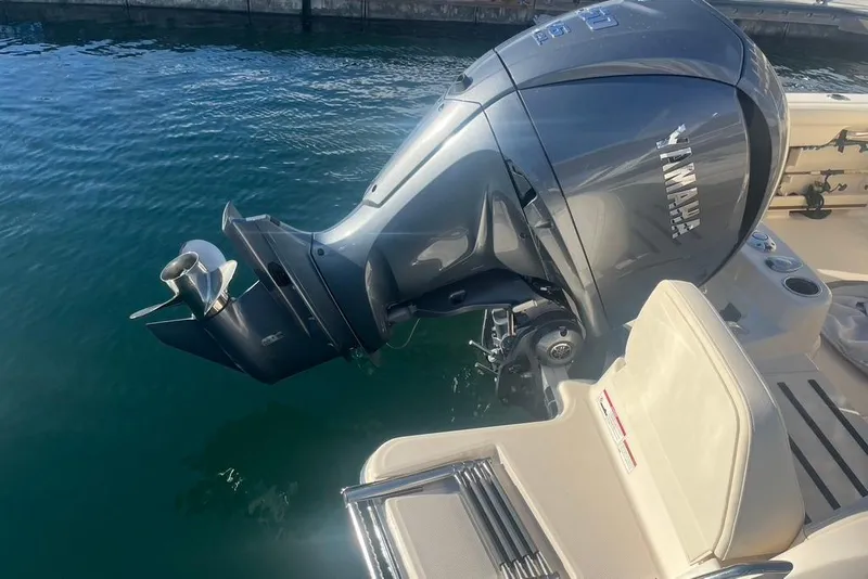 Slide: The Image of 2023 Grady-White Adventure 218 boat logo on sleek exterior. - 14