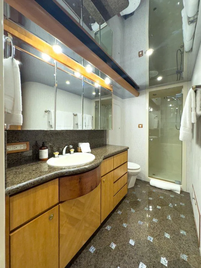 Slide: The Image of Luxurious bathroom in 2004 Cheoy Lee 81 Sport Yacht with modern fixtures and elegant design. - 25