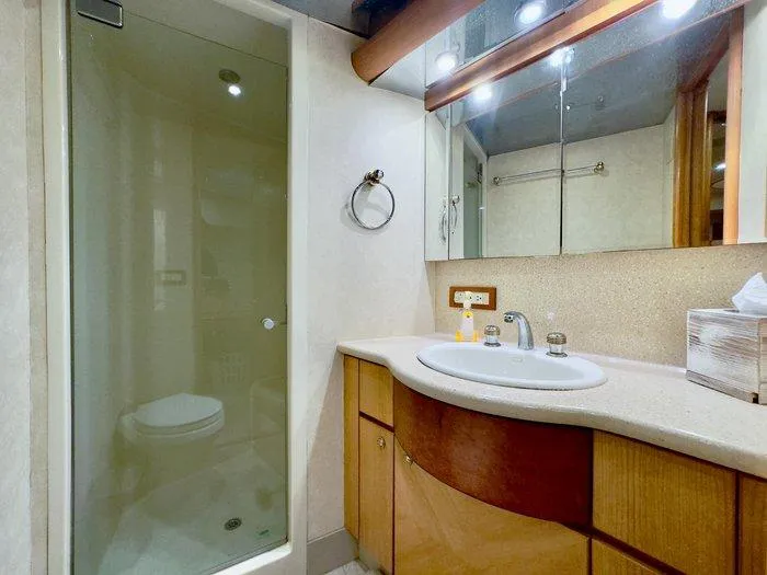 Slide: The Image of Luxurious bathroom in 2004 Cheoy Lee 81 Sport Yacht with shower and vanity. - 31