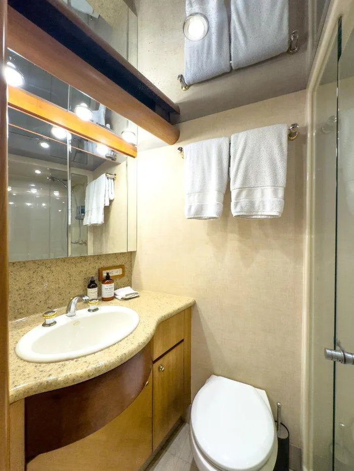 Slide: The Image of Luxurious bathroom in 2004 Cheoy Lee 81 Sport Yacht with modern fixtures and elegant design. - 37