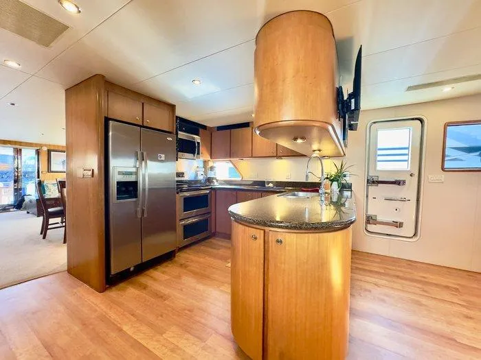 Slide: The Image of Luxurious kitchen interior of 2004 Cheoy Lee 81 Sport Yacht with modern appliances. - 5