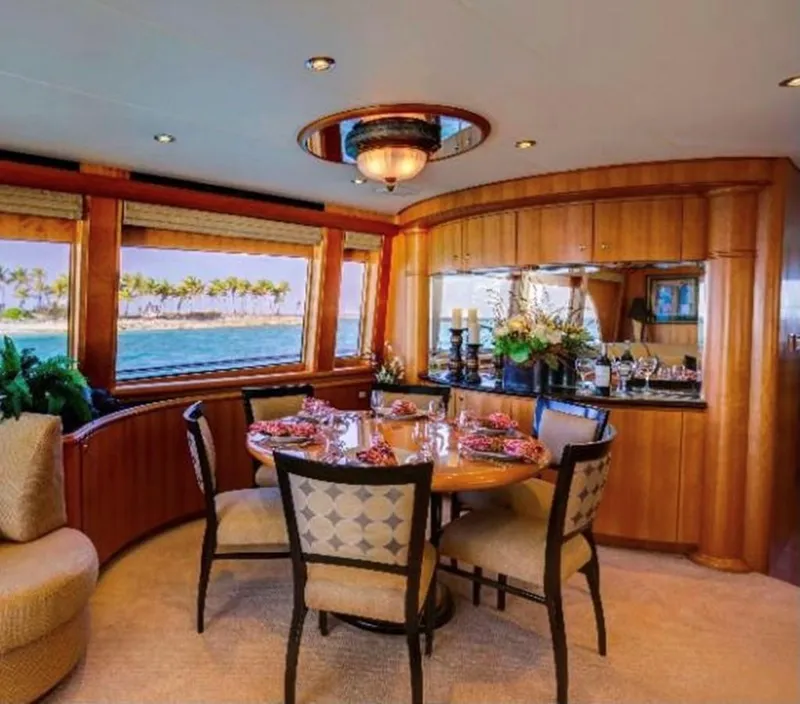 Slide: The Image of Luxurious dining area on 2004 Cheoy Lee 81 Sport Yacht with ocean view. - 9