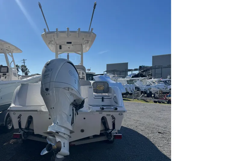 Slide: The Image of 2023 Sea Fox 248 Commander boat with Yamaha outboard motor, displayed outdoors. - 19