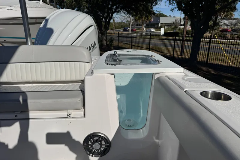 Slide: The Image of 2023 Sea Fox 248 Commander boat interior with seating and Yamaha engine. - 21