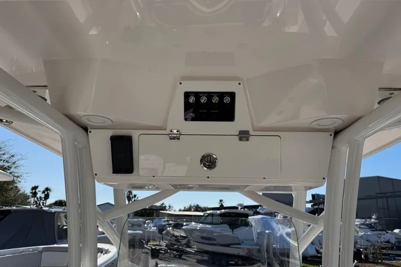 Slide: The Image of 2023 Sea Fox 248 Commander boat console with control panel and storage compartment. - 28