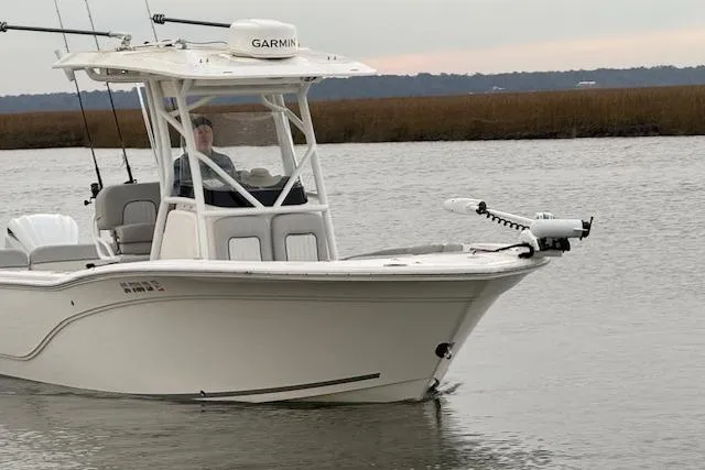 Slide: The Image of 2023 Sea Fox 248 Commander boat cruising on calm water with Garmin equipment. - 9