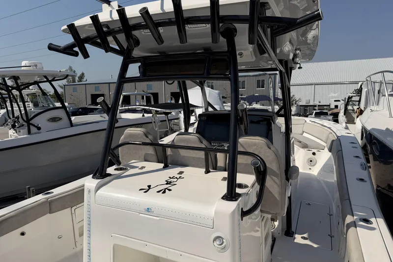 Slide: The Image of 2020 Sea Fox 328 Commander boat interior with helm and seating area. - 8