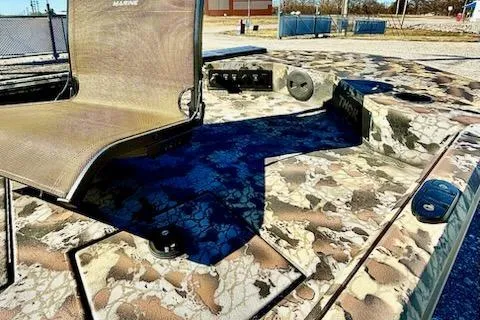 Slide: The Image of 2026 Thor Fish Hammer 1754 LR boat with camouflage design and seating. - 4