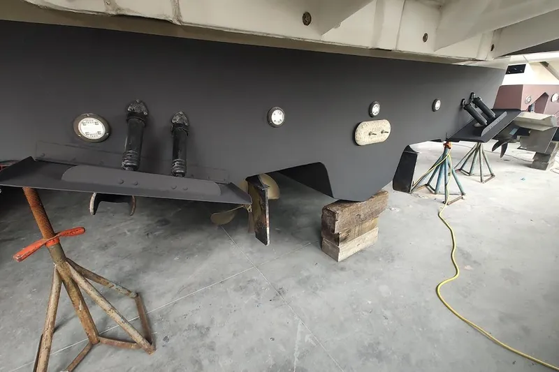 Slide: The Image of 2006 Sea Ray 48 Sundancer hull on stands, showcasing maintenance setup. - 36