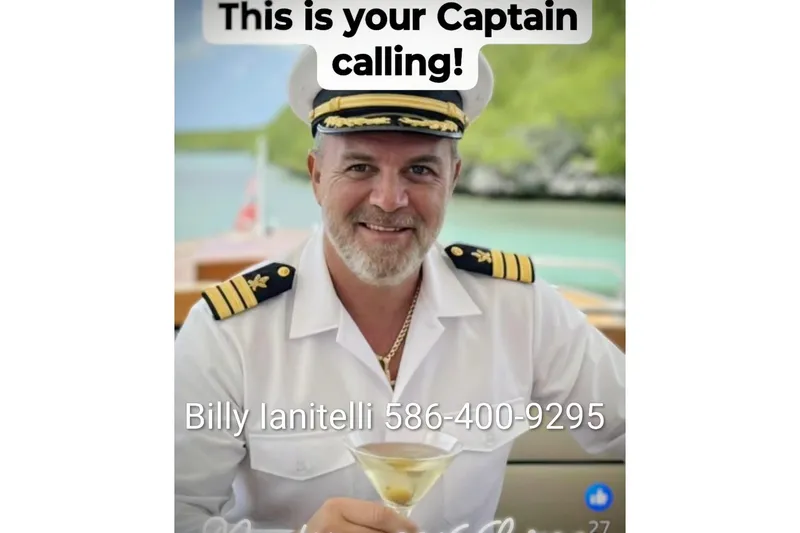 Slide: The Image of Captain in uniform holding a drink on a 2006 Sea Ray 48 Sundancer yacht. - 39