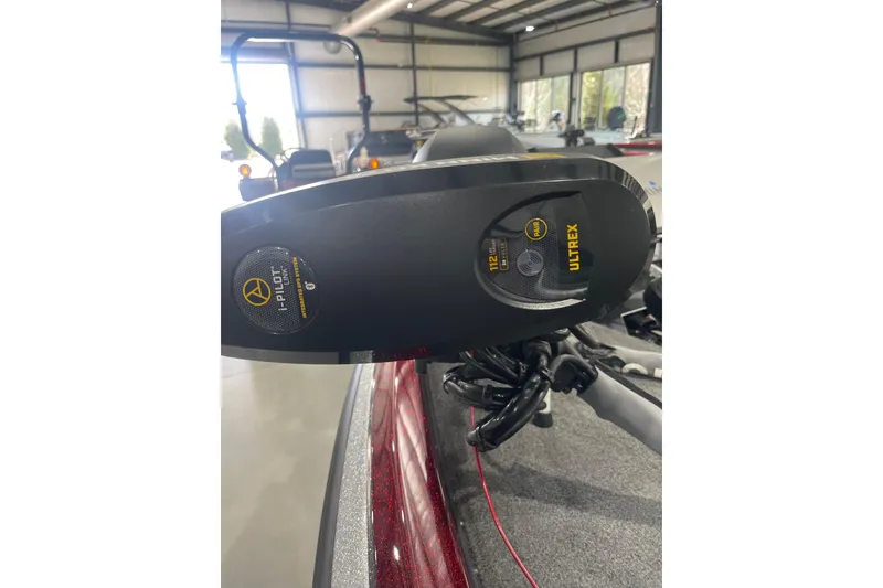 Slide: The Image of Trolling motor on 2022 Skeeter ZXR21 boat in a showroom setting. - 11