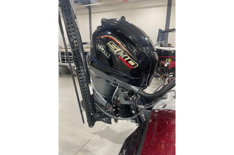 Slide: The Image of 2022 Skeeter ZXR21 with Yamaha VMAX SHO outboard motor in showroom. - 2