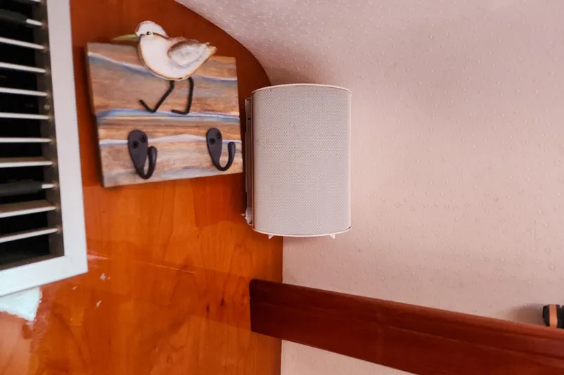 Slide: The Image of Compact bathroom in a 2001 Privilege 435 yacht with sink and toiletries. - 102