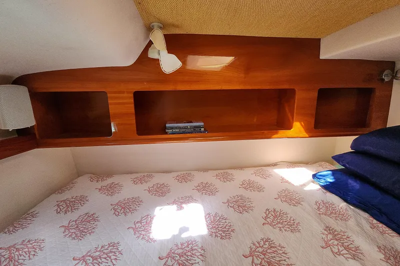 Slide: The Image of Interior of 2001 Privilege 435 yacht with control panels and wooden finish. - 103