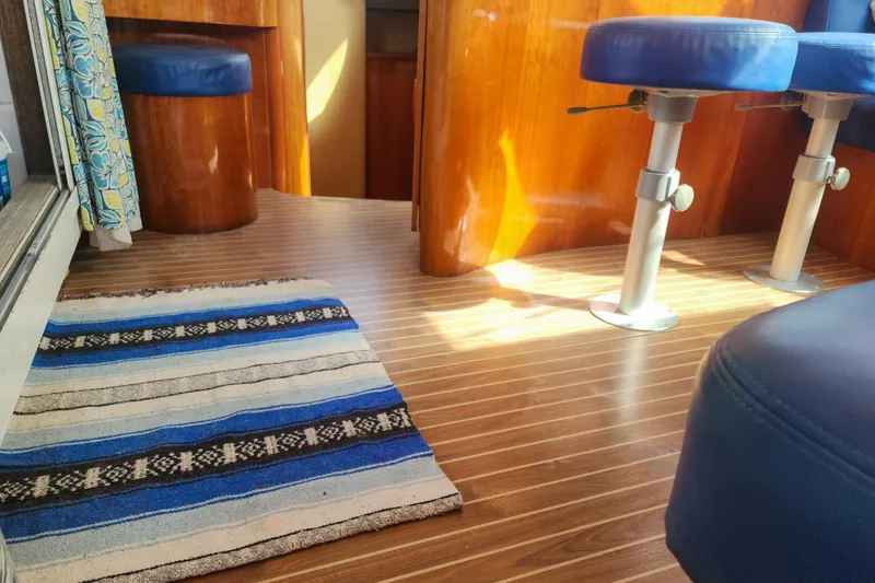 Slide: The Image of Compact bathroom in a 2001 Privilege 435 yacht, featuring a toilet and storage. - 106