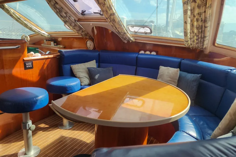 Slide: The Image of Small bathroom in a 2001 Privilege 435 yacht with toilet and sink. - 108