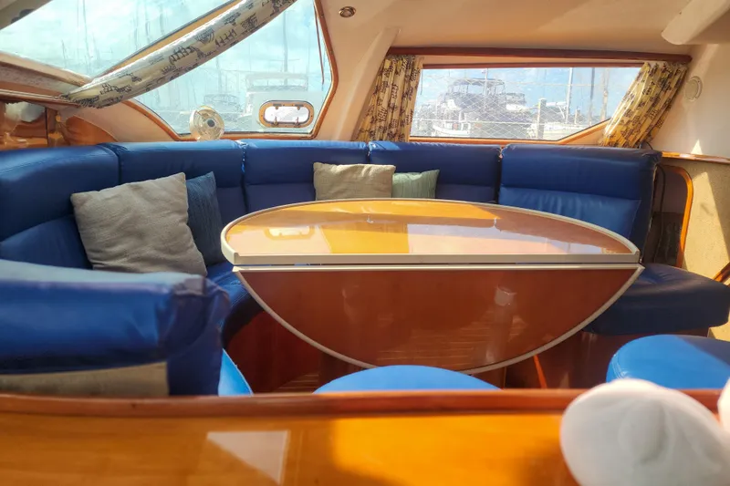 Slide: The Image of Cozy cabin interior of 2001 Privilege 435 yacht with bed and wooden accents. - 110