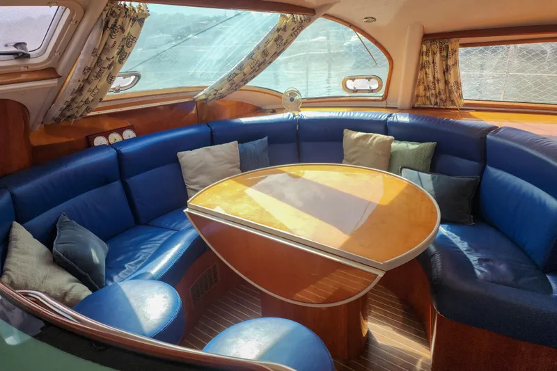 Slide: The Image of Luxurious wooden interior of 2001 Privilege 435 yacht with stairs and hallway. - 112