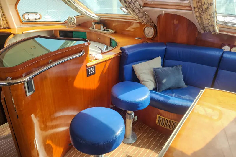 Slide: The Image of Interior of 2001 Privilege 435 yacht with polished wood and nautical decor. - 113