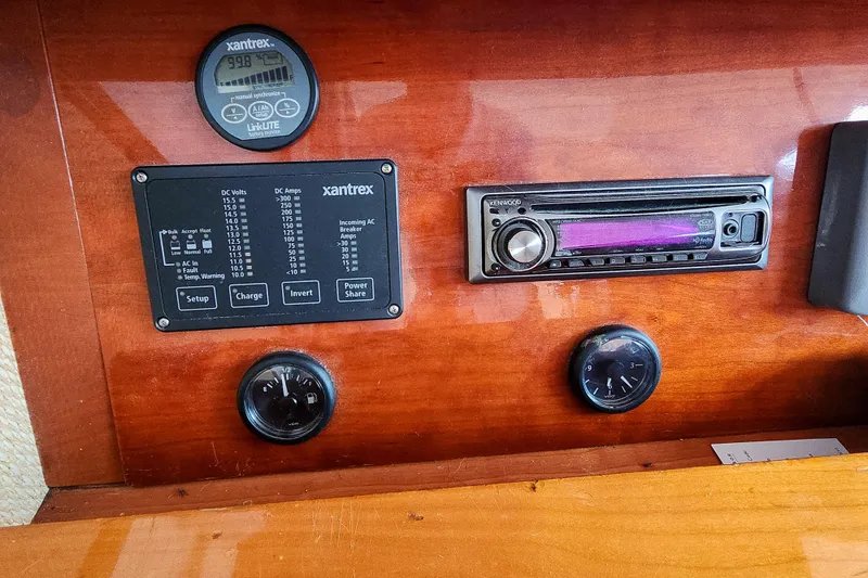 Slide: The Image of Victron Energy MultiPlus and Centaur battery chargers in a 2001 Privilege 435 yacht. - 118