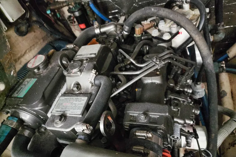 Slide: The Image of Aerial view of a 2001 Privilege 435 catamaran docked at a marina. - 140