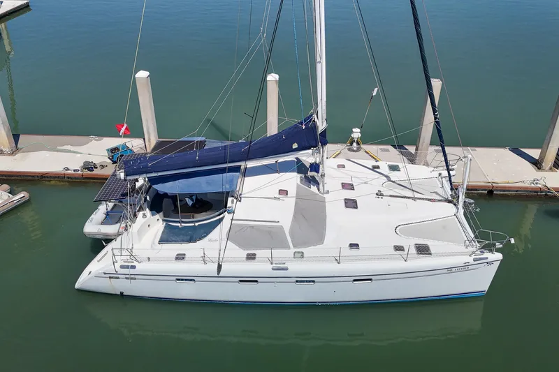 Slide: The Image of Catamaran Privilege 435 (2001) on a travel lift at Baltimore Marine Center. - 152