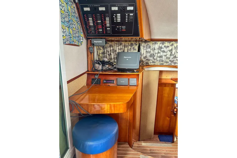 Slide: The Image of Luxurious interior of 2001 Privilege 435 yacht with blue seating and wooden accents. - 51