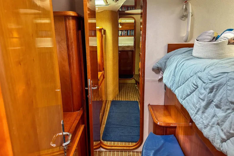 Slide: The Image of Luxurious 2001 Privilege 435 yacht kitchen with stove, oven, and wooden cabinetry. - 61