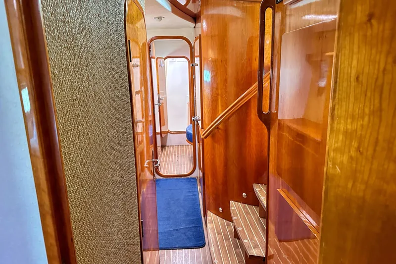 Slide: The Image of Wooden yacht kitchen with built-in oven and Trident gas control panel, Privilege 435, 2001. - 65