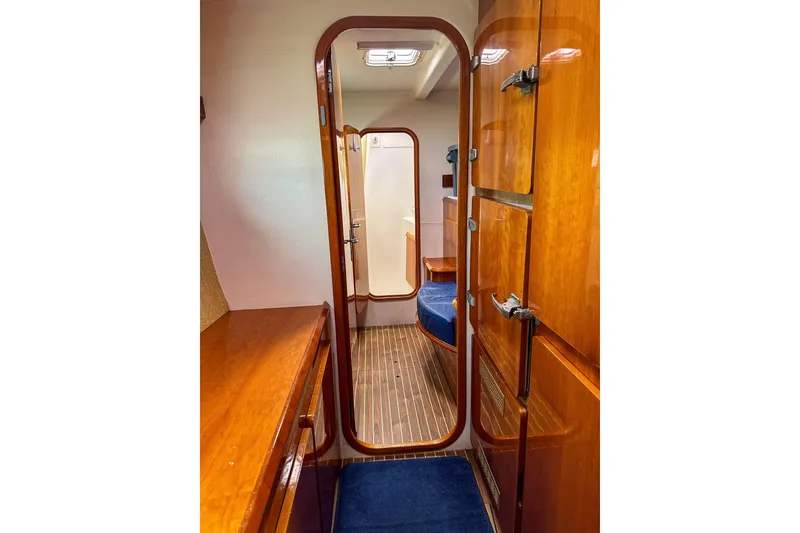 Slide: The Image of Interior of a 2001 Privilege 435 yacht kitchen with open fridge and oven. - 66
