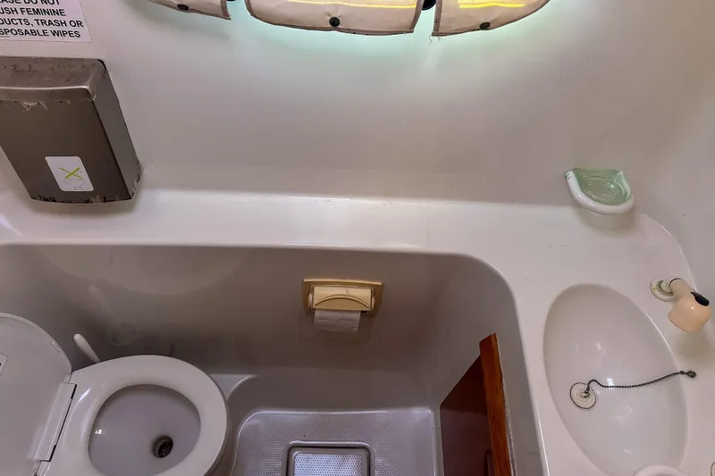 Slide: The Image of Interior of 2001 Privilege 435 yacht with navigation equipment and control panels. - 69