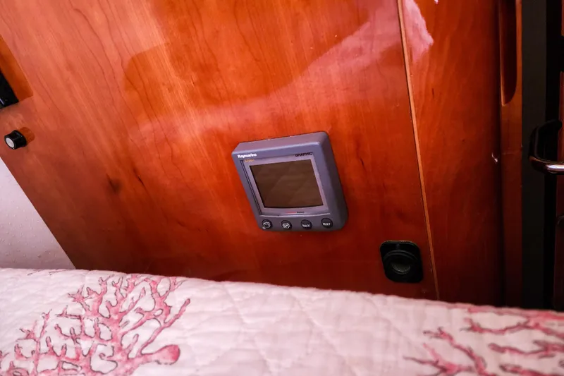 Slide: The Image of Control panel of a 2001 Privilege 435 yacht with Xantrex and Kenwood systems. - 72