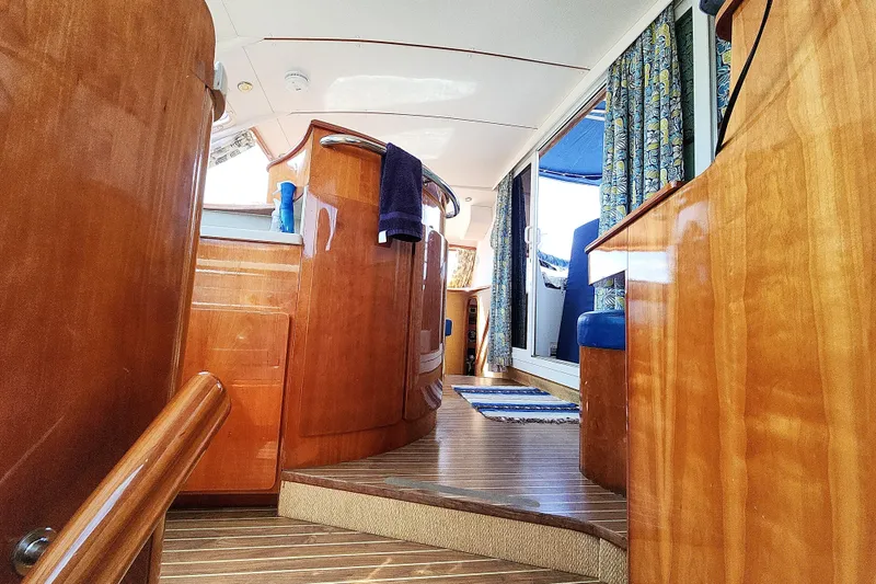 Slide: The Image of Wooden interior of Privilege 435 yacht with Raymarine display, 2001 model. - 78