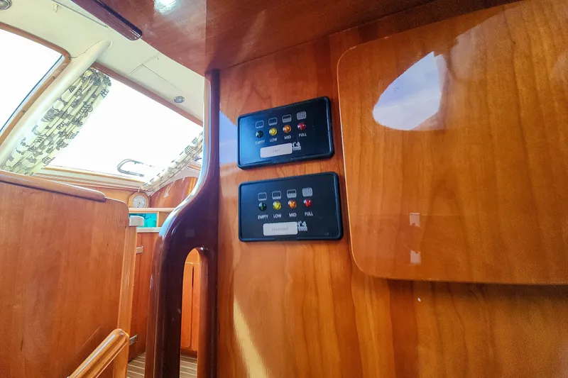 Slide: The Image of Wall-mounted speaker and decorative bird plaque on Privilege 435 yacht interior. - 79