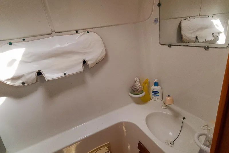 Slide: The Image of Cozy cabin interior of 2001 Privilege 435 yacht with wooden furnishings and bunk beds. - 83