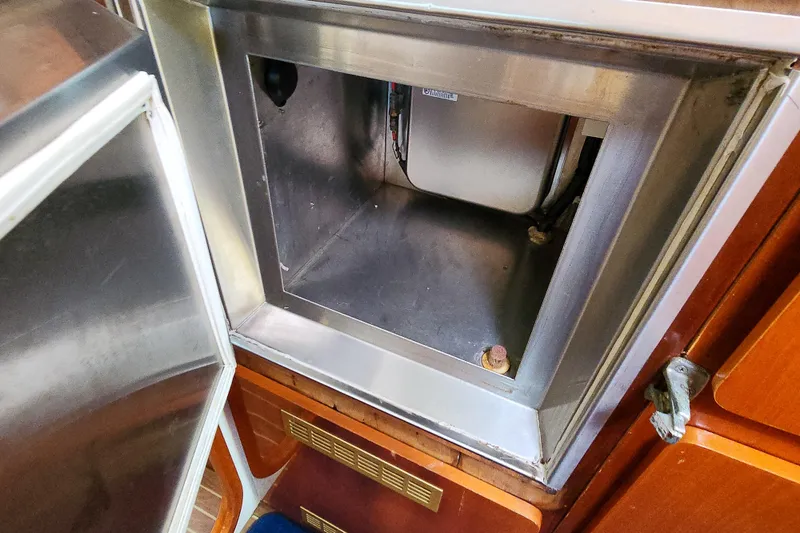 Slide: The Image of Cozy cabin interior of 2001 Privilege 435 yacht with bed and storage. - 88