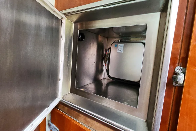 Slide: The Image of Compact bathroom in 2001 Privilege 435 yacht with sink and toiletries. - 89