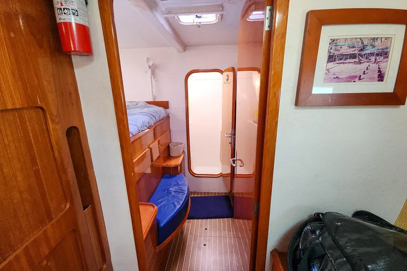 Slide: The Image of Interior of 2001 Privilege 435 yacht with Dometic CFX cooler and storage. - 99