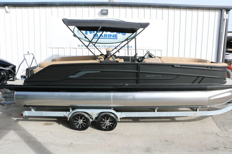 Slide: The Image of 2026 Evotti 725QL pontoon boat on trailer, sleek design, black exterior. - 11