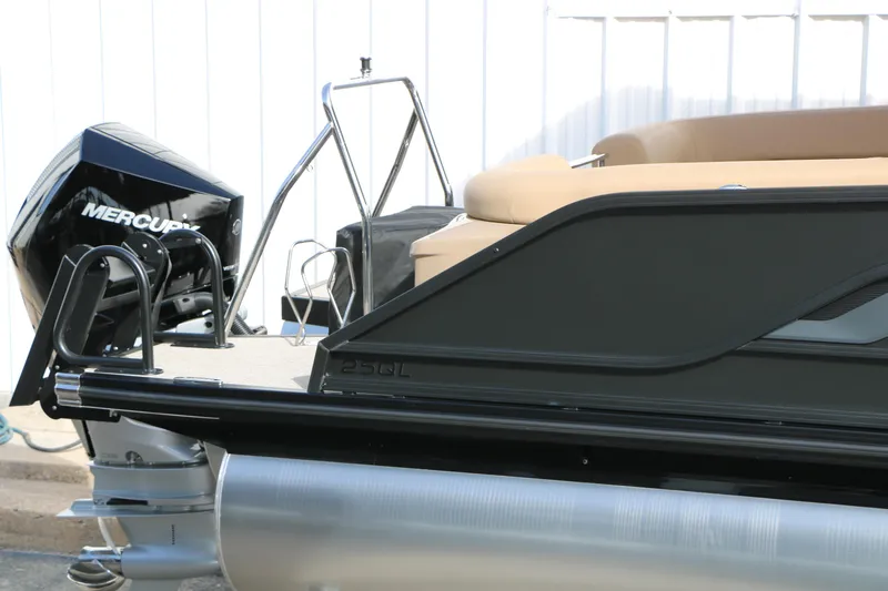 Slide: The Image of 2026 Evotti 725QL boat with Mercury engine, sleek design, and comfortable seating. - 12